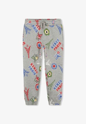 Pantalon de survêtement gris avec taille à cordon, présentant des imprimés colorés de la Tour Eiffel, de fleurs, et "KENZO PARIS" en rouge et bleu.