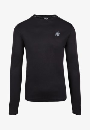 Melna garenā piedurkne krekls, kas izgatavots no teksturētas auduma. Tam ir apaļa kakla izgriezums un neliela pelēka gorillas logo krūšu rajonā, kā arī nepamanāmas plecu akcenti.