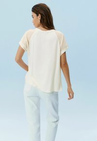 Next PLISSÉ SHORT SLEEVE STANDARD - Bluse - ecru
