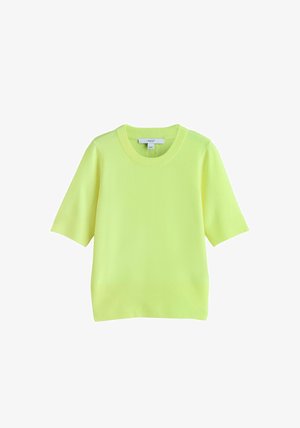 Maglione a maniche corte di colore giallo neon con scollo e orlo a coste. Realizzato in materiale morbido e testurizzato con una forma rilassata.