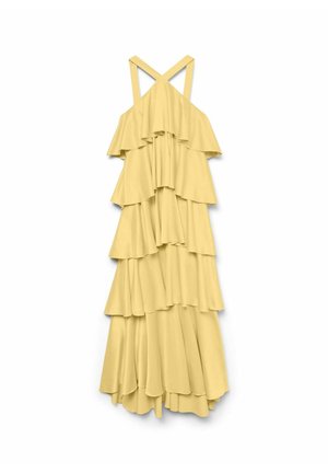 Geltona pakopinė suknelė su spageti petnešėlėmis, turinti sluoksniuotų volanų ir ilgą, plazdančią dizainą. Pagaminta iš lengvos medžiagos.