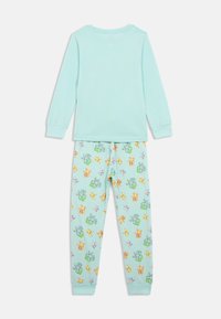 Mintgrünes Pyjama-Set mit langärmeligem Oberteil in einer einfarbigen Ausführung und Hose, die mit bunten Cartoon-Charaktermustern verziert ist.
