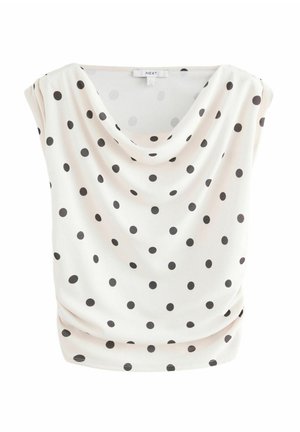 Balta palaidinė su gaubtu apykakle, dekoruota juodomis dėmėmis. Pagaminta iš minkštos, laisvai krintančios medžiagos, su trumpomis rankovėmis ir laisvu siluetu.