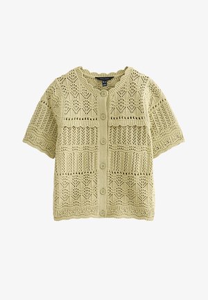 Cardigan beige en maille à manches courtes avec boutons sur le devant et motifs complexes en dentelle ajourée sur toute la surface.