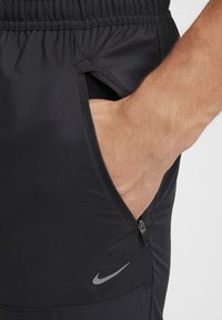 Nike Performance - Spodnie treningowe