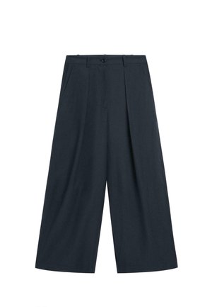 Marineblaue, weit geschnittene, verkürzte Hose mit vorderen Falten, Seitentaschen, Gürtelschlaufen und Knopfverschluss.