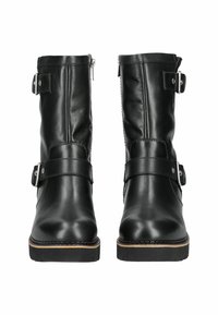 Botas de tobillo de cuero negro con punta cuadrada, dos correas ajustables con hebillas y una cremallera lateral. Suela de goma robusta con un ligero tacón.