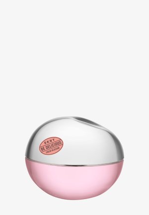 Rund parfymeflaske med sølvfarget topp og rosa bunn, merket "DKNY Be Delicious Fresh Blossom."
