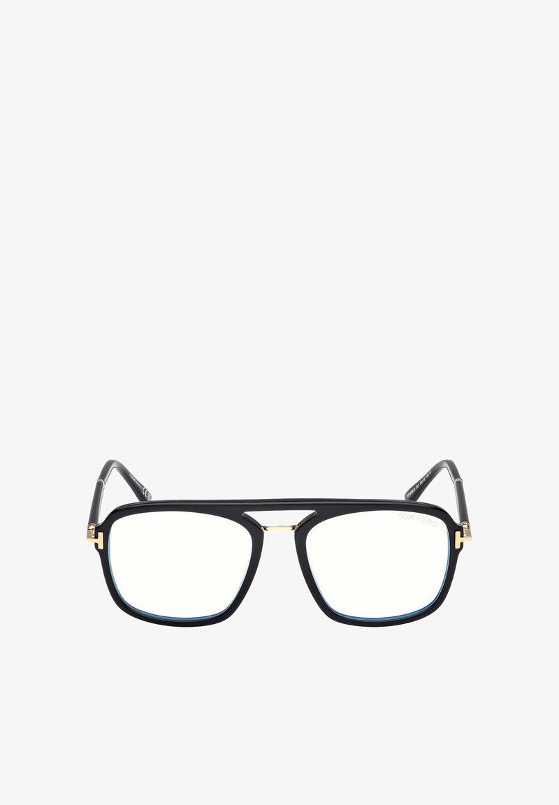 Occhiali rettangolari neri con sottili accenti dorati sul ponte e sulle cerniere, e lenti trasparenti, vista frontale su sfondo bianco.