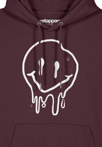 Bordeaux katoenen hoodie met een witte druipende smiley-afbeelding. Verstelbare koordjes en een voorkantzak maken het ontwerp compleet.