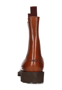 Stivale alla caviglia in pelle marrone con finitura lucida, pannelli laterali elasticizzati, linguette di presa e una robusta suola in gomma marrone.
