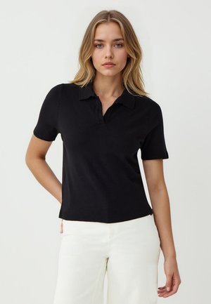 - Koszulka polo
