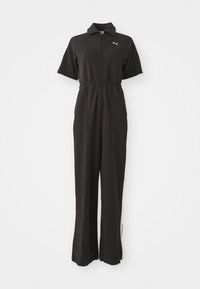 Svart jumpsuit med korte ermer, glidelåsåpning foran, elastisk midje og vide ben. Har hvite detaljer og en liten logo på brystet.