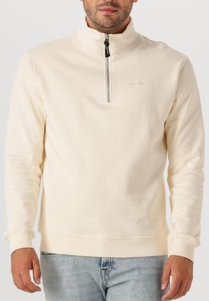 Beige pullover sweatshirt met een halve rits kraag, lange mouwen, geribbelde manchetten en zoom. Zachte stof, met een klein logo op de borst.