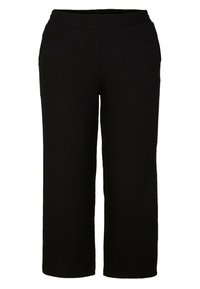 Pantalon large noir avec ceinture élastique et texture subtile en côtes verticales.