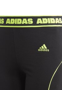 adidas Sportswear TIGHT - Leggings - black/lucid lemon