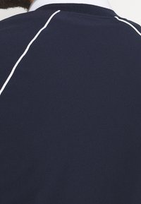 Lacoste Sport Bomber bunda - dark blue