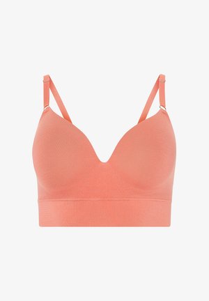 Reggiseno imbottito senza cuciture di colore rosa corallo con spalline sottili regolabili e fascia sottoseno larga per supporto e comfort.