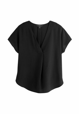 Blouse noire à manches courtes avec col en V et coupe ample, avec un détail pli devant.