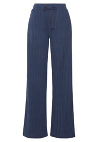 Marineblauwe geribbelde wijde broek met een elastische tailleband en verstelbaar koord. Zachte textuur met verticale strepen op de gehele lengte.