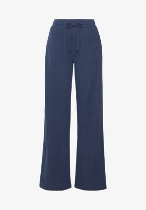 Pantalones de pierna ancha de canalé azul marino con cintura elástica y cordón ajustable. Textura suave con rayas verticales en todo el tejido.
