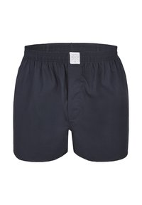 Marineblaue Baumwollboxershorts mit elastischem Bund, ausgestattet mit einem Frontzipper und einem in der Mitte oben eingestickten Etikett. Glatte Textur, schlichtes Design.