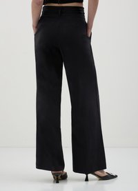 Calliope PALAZZO - Pantalon classique - nero
