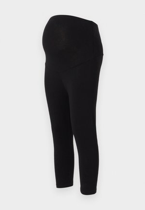 Crne trudničke tajice s visokim pojasom koje prilagođava rastućem trbuhu. Izrađene od rastezljivog, laganog materijala za udobnost.