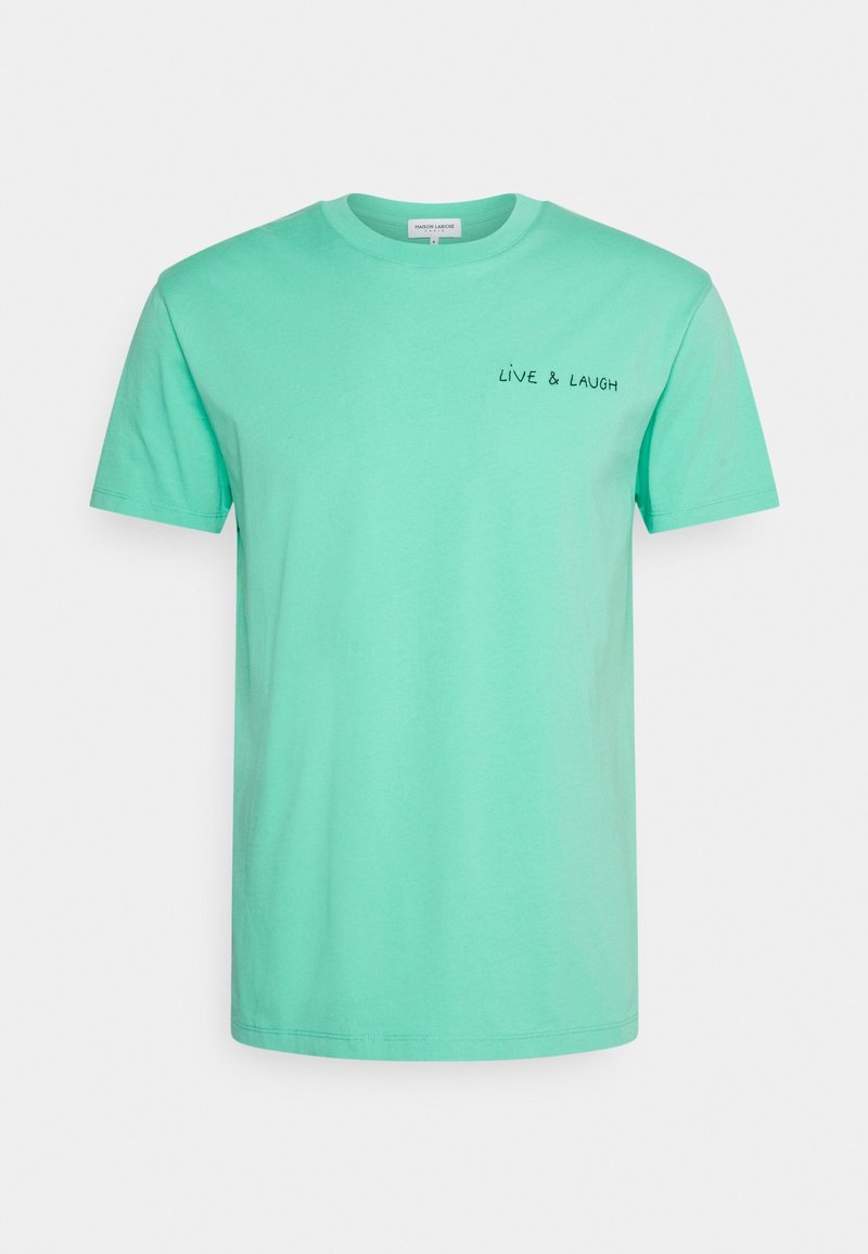 Mátově zelené bavlněné tričko s krátkými rukávy a kulatým výstřihem. Na horní levé straně je vyšívaný nápis "ŽIJ A SMĚJ SE" v černé barvě.