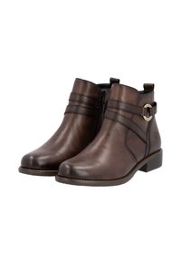 Bottines en cuir marron avec fermeture éclair, deux sangles horizontales, un accent circulaire décoratif et un petit talon bloc.