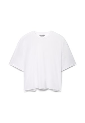 T-shirt bianca corta con maniche corte, scollo rotondo e orlo dritto. Realizzata in tessuto morbido, presenta una vestibilità comoda.