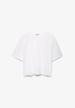 T-shirt bianca corta con maniche corte, scollo rotondo e orlo dritto. Realizzata in tessuto morbido, presenta una vestibilità comoda.