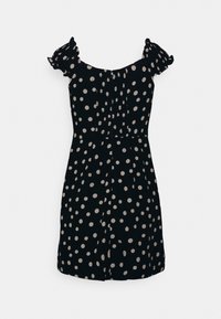 Schwarzes Kleid mit weißen Punkten, kurzen Puffärmeln und einem gerafften Oberteil, das eine geraffte Taille und eine verspielte, fließende Silhouette aufweist.