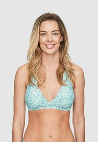 Mintgrön bikiniöverdel med vitt blommönster, triangelformad, djup V-ringning och justerbara band. Slät tygtextur.