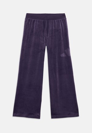 Pantalons de détente à jambes larges en velours violet profond, dotés d'une taille à cordon de serrage et d'une texture douce, conçus pour le confort et la liberté de mouvement.