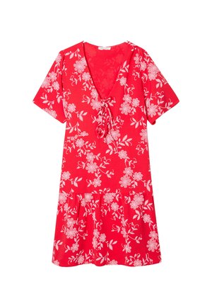 Robe rouge à manches courtes avec un décolleté en V, ornée de motifs floraux blancs et d'un détail à cordon au niveau de la poitrine. Bas évasé avec un ourlet volanté.