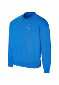 Blauwe sweatshirt van zacht materiaal, met een ronde hals, lange mouwen en een witte logo op de borst. Inclusief een gekleurd label aan de zoom.