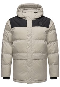 Giubbotto imbottito beige con pannello superiore nero, texture trapuntata, cappuccio regolabile e due ampie tasche frontali. Tessuto morbido, taglio dritto.