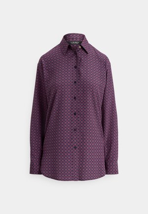 Camisa de manga larga morada con un patrón geométrico en rosa y azul, cierre frontal con botones, cuello clásico y textura de tela suave.