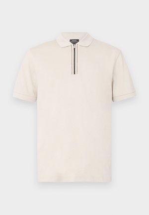 Cream short-sleeve polo shirt with a pointed collar, featuring a zippered placket with black and white stripes, crafted from textured fabric.