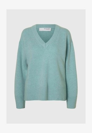 Lyseblågrøn V-hals trøje lavet af blødt materiale med ribbede manchetter og kant, med en afslappet pasform og minimalistisk design.