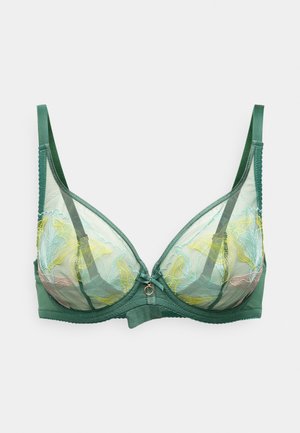 Soutien-gorge vert en tissu transparent, broderie florale en jaune et rose, et un petit accent métallique au centre. Bretelles réglables.