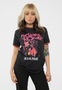 Black graphic t-shirt with red accents, featuring a colorful band design of a skeleton in a top hat, titled "My Chemical Romance: The Black Parade."