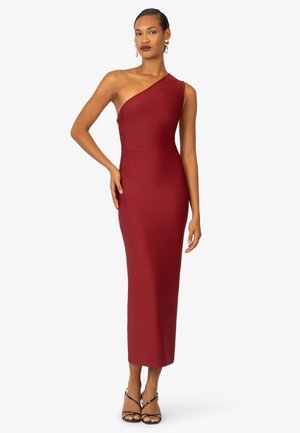 Asymmetrische jurk met één schouder in diep bordeauxrood. Gemaakt van rekbare stof, met een slanke silhouet en een enkellange ontwerp.