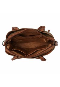 Sac à main en cuir marron avec un intérieur spacieux, doté d'une doublure en tissu beige, de compartiments zippés et de poches d'organisation.