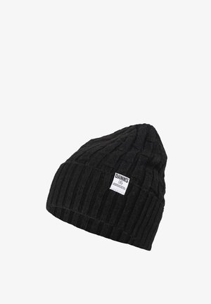 Black knitted beanie with vertical ribbing texture, pointed top, and a small white logo patch on the side. Lightweight, warm fabric.