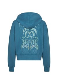 Sweatshirt court bleu en coton avec un grand graphisme floral et logo de surf en vert clair dans le dos. Dispose d'une capuche avec cordon.