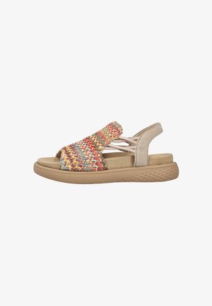Sandale en tissu tissé avec des fils multicolores, semelle intérieure rembourrée beige, design ouvert à l'avant et sangle arrière de soutien. Semelle texturée couleur tan.