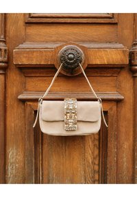 Alma en Pena Geantă de mână - marrón jaspeado