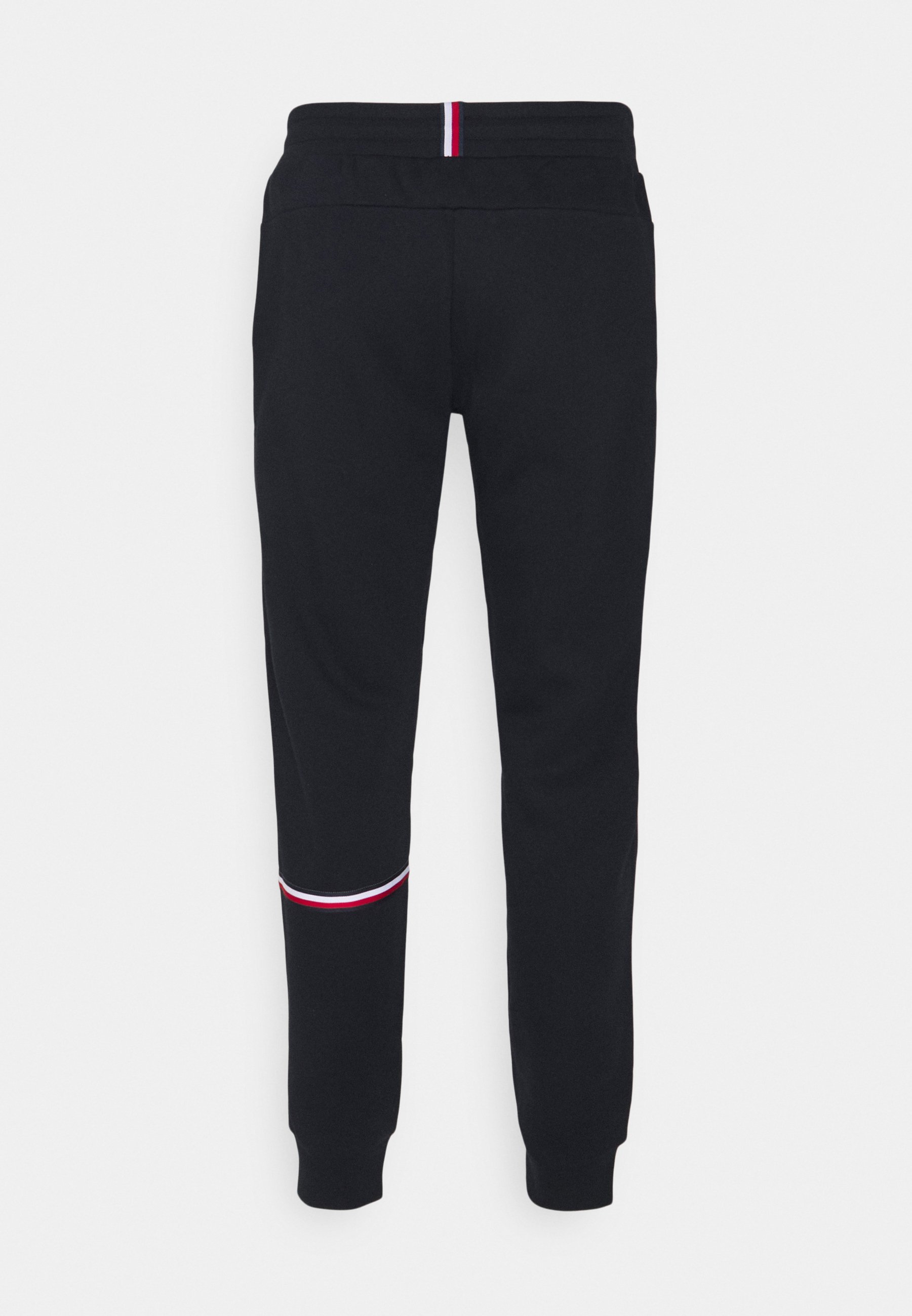 Tommy Hilfiger TAPE SEASONAL PANT - Pantalones deportivos - desert sky/azul  marino - Zalando.es